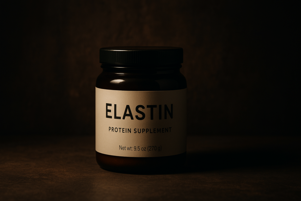A jar labeled "ELASTIN Protein Supplement" sits under moody, directional lighting against a textured dark background. The striking contrast and minimalist setting reflect the potent, science-backed role of elastin protein in promoting youthful skin structure.